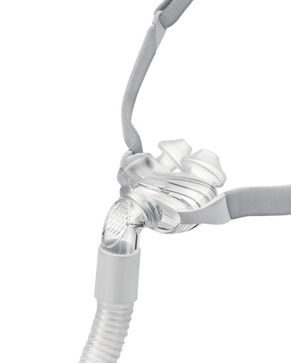 Inogen Aurora P1 nasal pillows CPAP mask with headgear, angled view